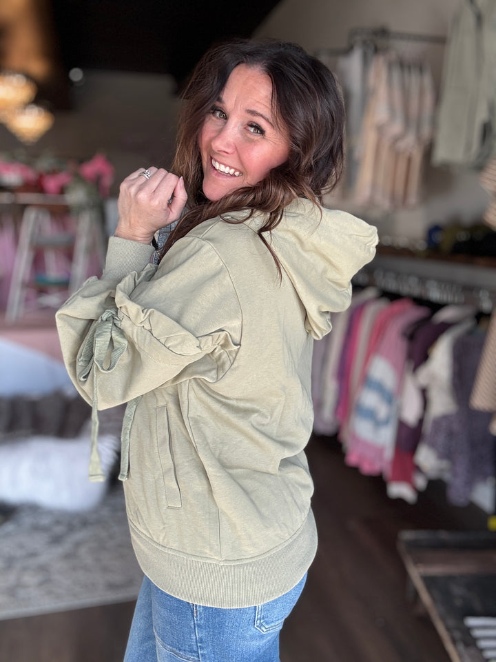 The Sage Bow Zip Up