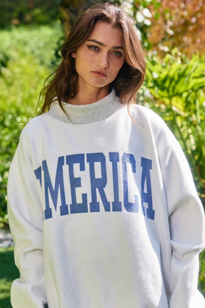 ****PREORDER WILL NOT BE HERE UNITIL JULY****. Reversible USA Grey Mock Neck Sweatshirt